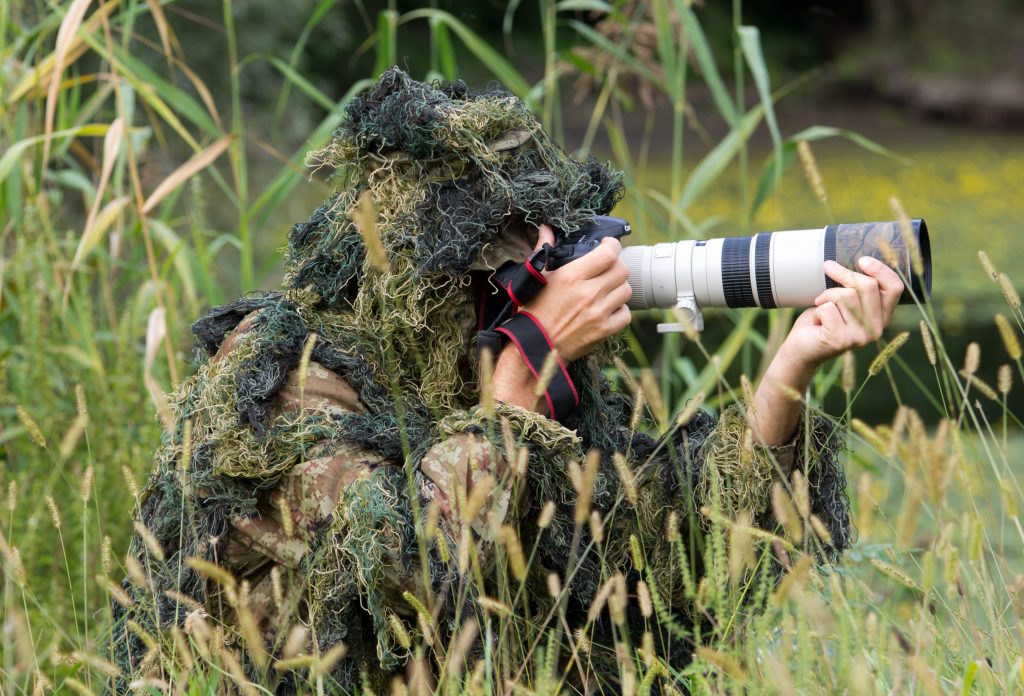 photographe camouflé pour prendre